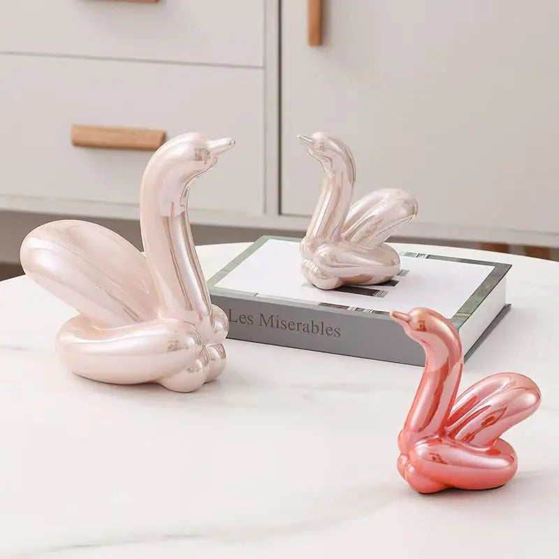 Mini ceramic balloon swan sculptures set of 3, pastel pink/peach tones for desk decor on Tampa Home & Garden Store