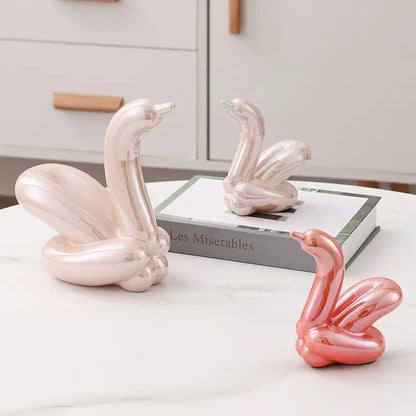 Mini ceramic balloon swan sculptures set of 3, pastel pink/peach tones for desk decor on Tampa Home & Garden Store