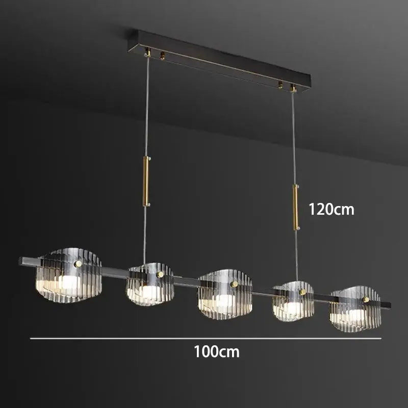 DecorBites LED pendant chandelier with five ribbed glass shades on a brass bar on Tampa Home & Garden Store