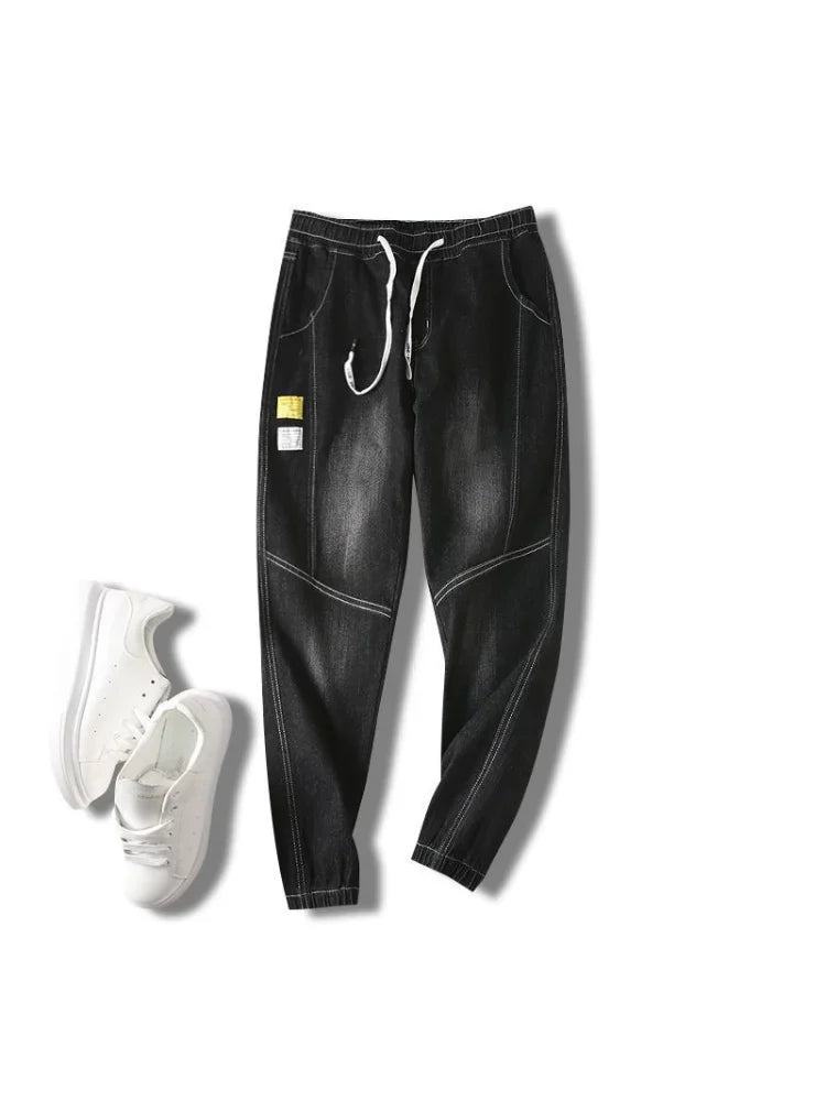 UpTrend Deals men's black wide-leg denim jeans with white drawstring; 1 pair white sneakers on Tampa Home & Garden Store