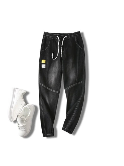 UpTrend Deals men's black wide-leg denim jeans with white drawstring; 1 pair white sneakers on Tampa Home & Garden Store