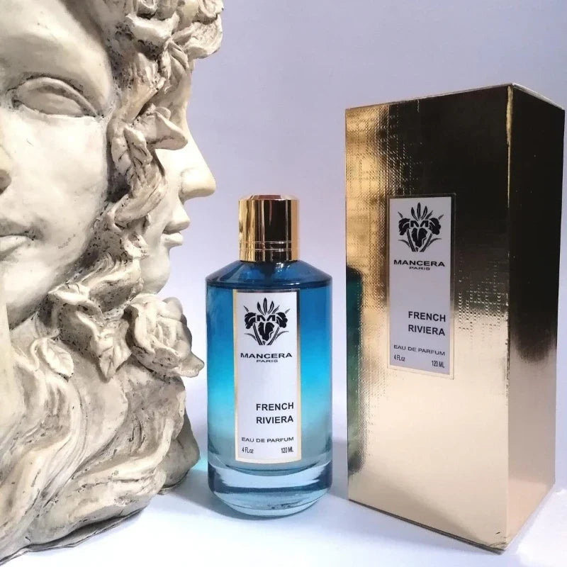 Mancera Paris French Riviera EDP bottle with blue gradient glass and gold cap beside a gold box on Tampa Home & Garden Store
