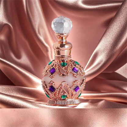 Exotic Arabian perfume bottle by Silcy Skin with a jeweled crown design and crystal stopper on Tampa Home & Garden Store