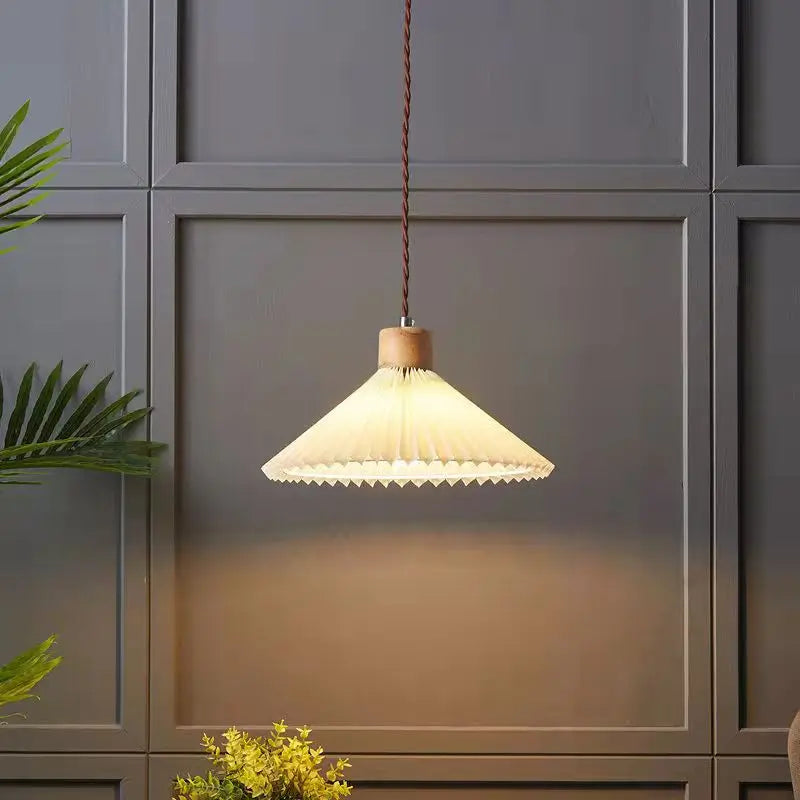 Retro pleated pendant light with solid wood top and beige fabric shade, twisted brown cord on Tampa Home & Garden Store