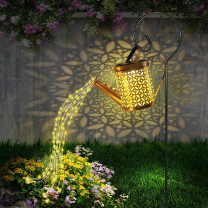 Gold solar kettle garden light by Perfecsy on stake with perforated floral pattern on Tampa Home & Garden Store