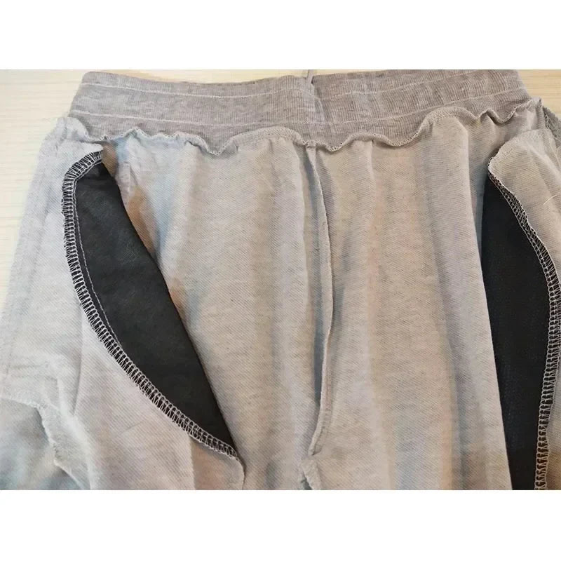 Men jogger pants, light gray sweatpants with elastic waistband and black pocket lining on Tampa Home & Garden Store