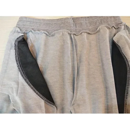 Men jogger pants, light gray sweatpants with elastic waistband and black pocket lining on Tampa Home & Garden Store