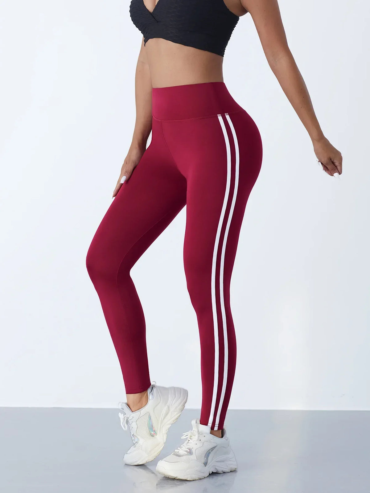 Women's striped yoga leggings slim fit burgundy with white side stripes on Tampa Home & Garden Store
