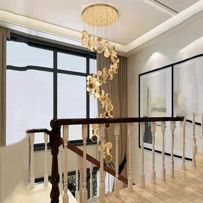 DecorBites LED Pendant Chandeliers gold disc pendants cascading over staircase on Tampa Home & Garden Store