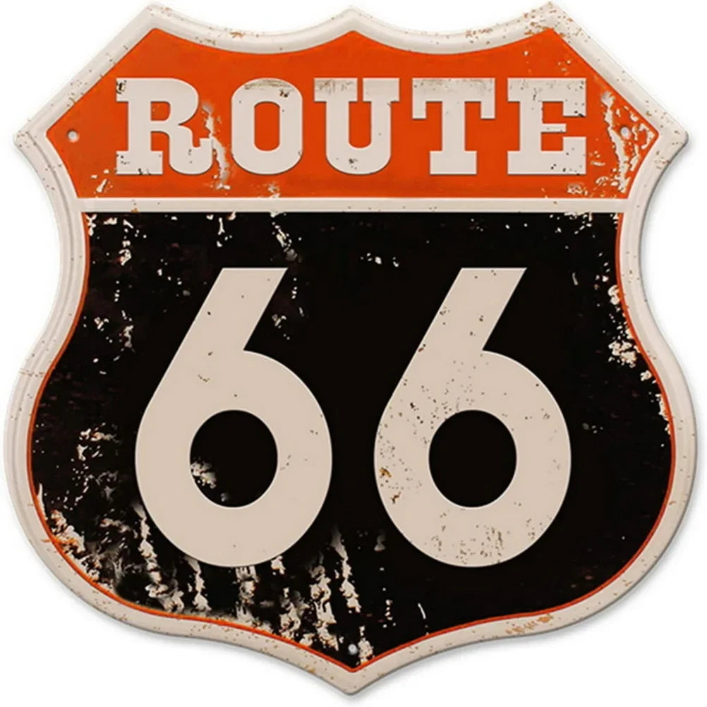 Route 66 shield tin sign with distressed orange top and black field, bold white 66 on Tampa Home & Garden Store