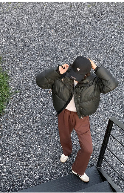 Women’s cropped black cotton-padded puffer jacket by UpTrend Deals, Chanel cap visible on Tampa Home & Garden Store