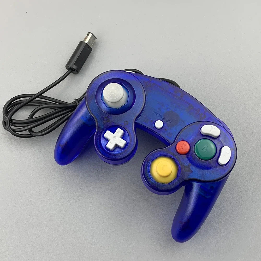 FLIPSTYLEZLLC translucent blue wired GameCube controller with white D-pad and yellow C-stick on Tampa Home & Garden Store