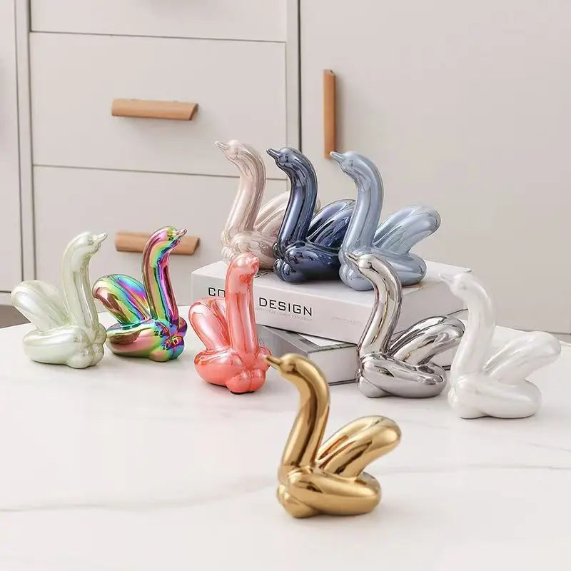 Assorted mini ceramic balloon-swans decorative figurines for desk or shelf decor on Tampa Home & Garden Store