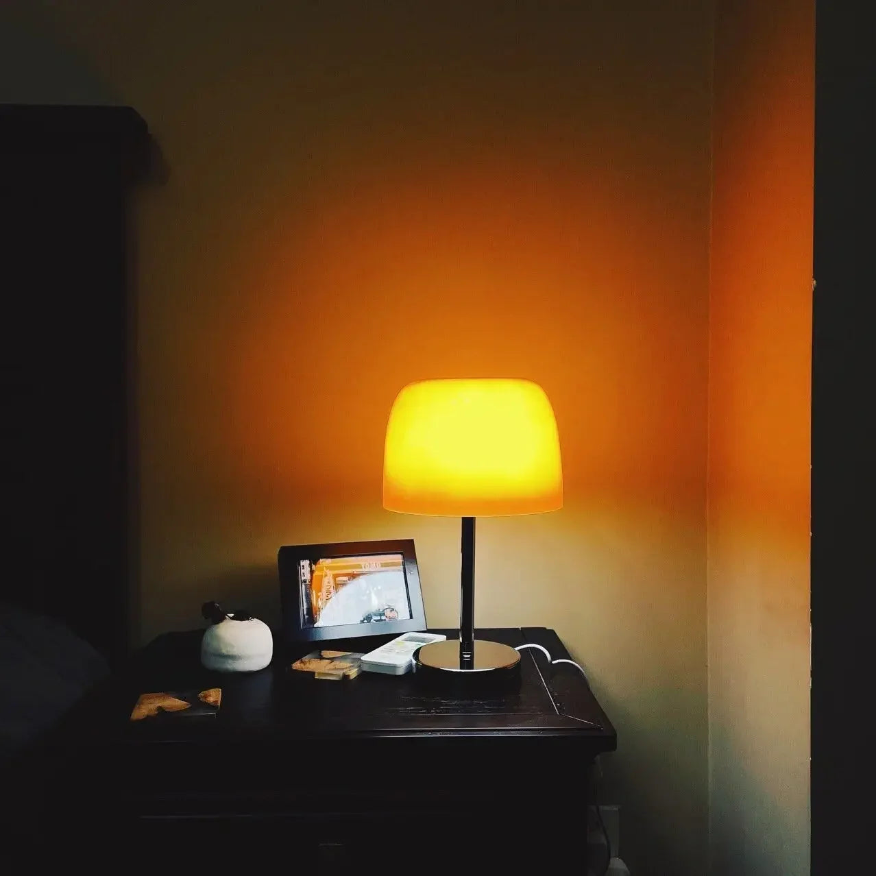 Perfecsy medieval glass table lamp with warm amber shade on a dark wood nightstand on Tampa Home & Garden Store