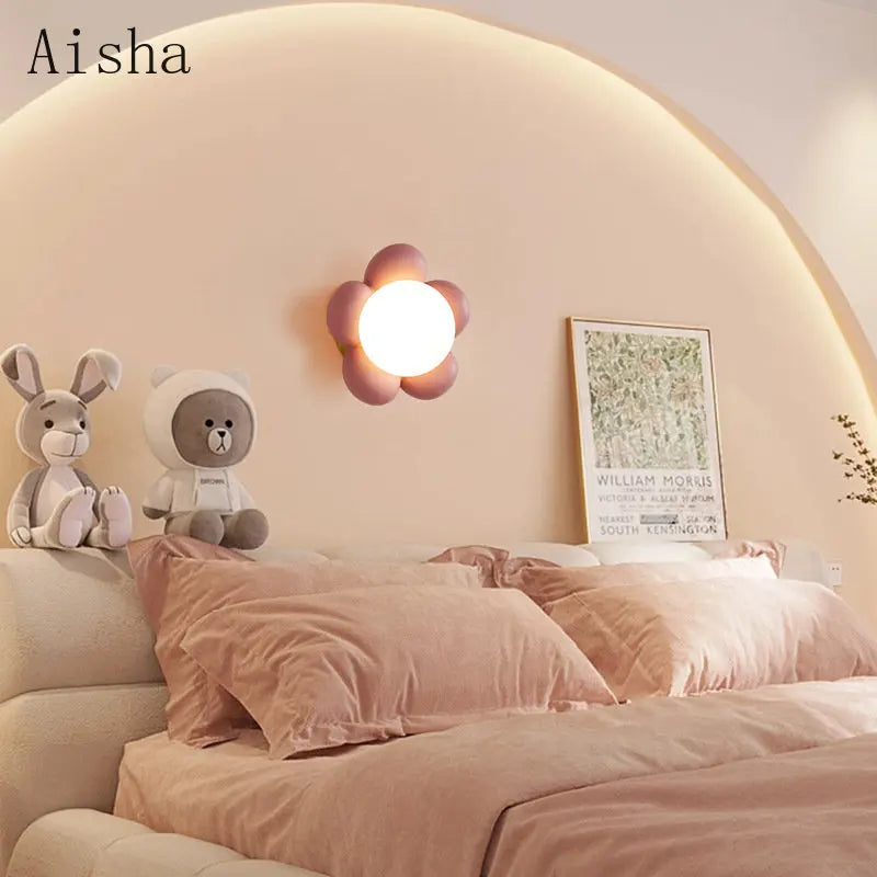 DecorBites Kids Amusement Park Flower LED Wall Lamp with pink petals on peach wall above bed on Tampa Home & Garden Store