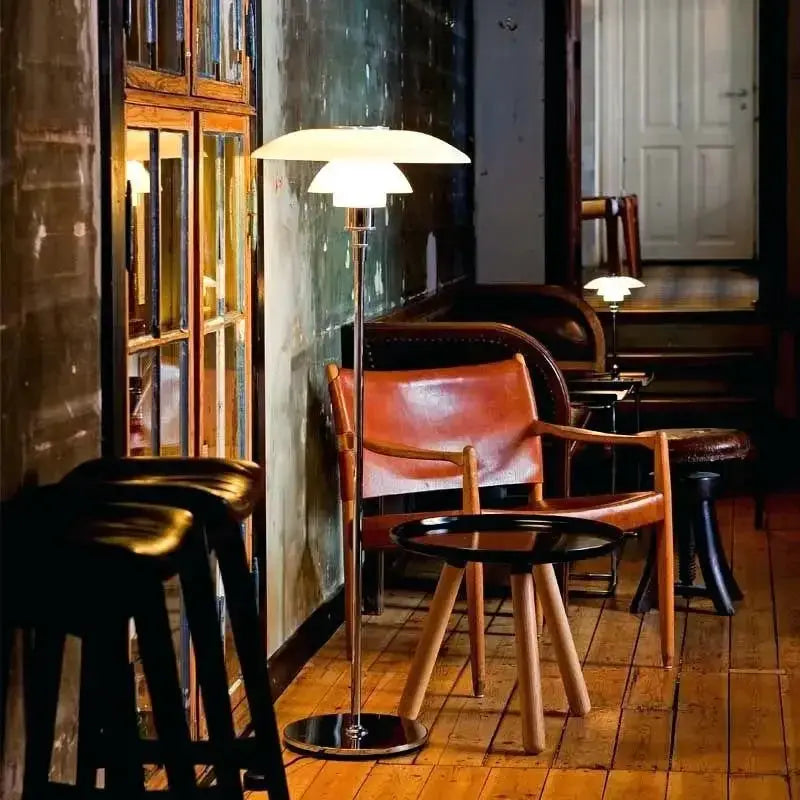 DecorBites LED floor lamp with white shade and chrome stem; two lamps visible in living area on Tampa Home & Garden Store