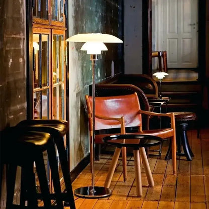DecorBites LED floor lamp with white shade and chrome stem; two lamps visible in living area on Tampa Home & Garden Store