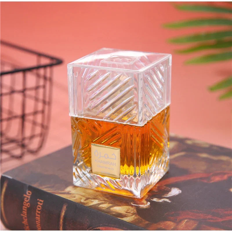 Khamrah unisex perfume bottle in crystal cube with amber liquid and gold label on Tampa Home & Garden Store