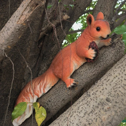 Squirrel figurine resin tree climber statue orange hugger holding pinecone garden decor on Tampa Home & Garden Store