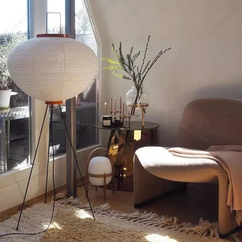 Perfecsy LED Rice Paper Floor Lamp with white shade on black tripod base in living room on Tampa Home & Garden Store