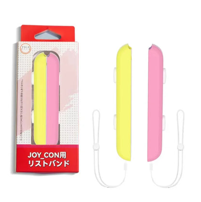Switch Joy-Con wrist strap pair in yellow and pink with white lanyards by FLIPSTYLEZLLC on Tampa Home & Garden Store