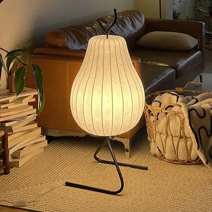 DecorBites Japanese Silk Floor Lamp with white pleated LED fabric shade on a black curved tripod base on Tampa Home & Garden Store