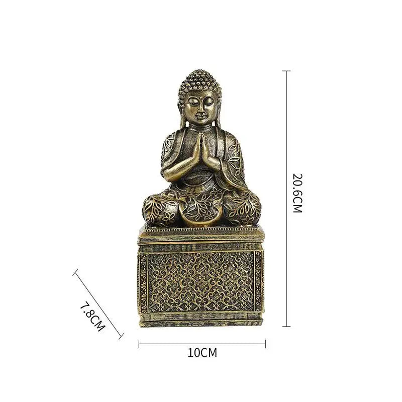 Buddha statue resin figurine, bronze, seated with hands in prayer on pedestal on Tampa Home & Garden Store