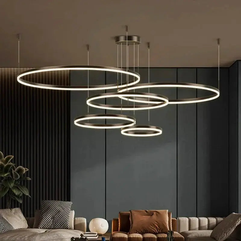 DecorBites LED pendant chandeliers five circular LED rings in brushed metal living room on Tampa Home & Garden Store