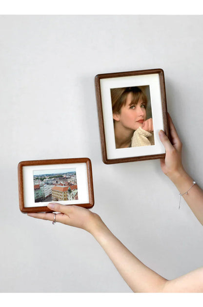 Solid wood frame Moktan Sabai, mortise-tenon handcrafted, two brown frames held by hands on Tampa Home & Garden Store