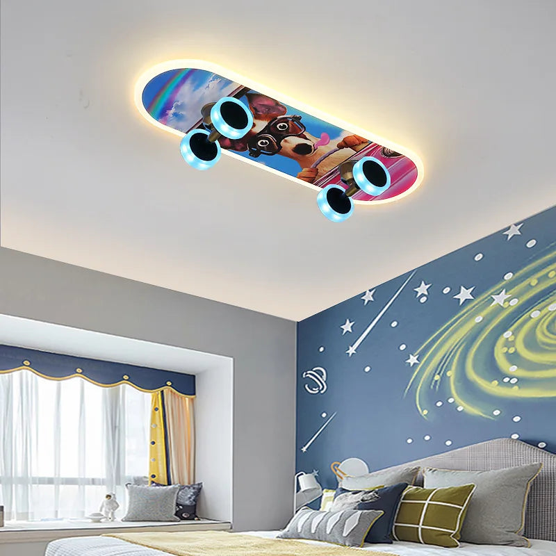 DecorBites Kids Skateboard LED ceiling light with four blue LED wheels on a colorful deck on Tampa Home & Garden Store