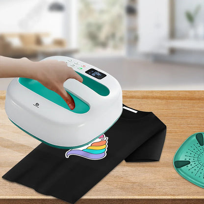 HP2 Heat Press Machine 9x9 portable press by UpTrend Deals pressing a black T-shirt with rainbow unicorn decal on Tampa Home & Garden Store