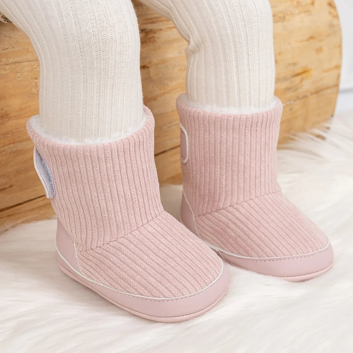 Newborn baby winter boots soft pink corduroy booties with white lining pair on Tampa Home & Garden Store