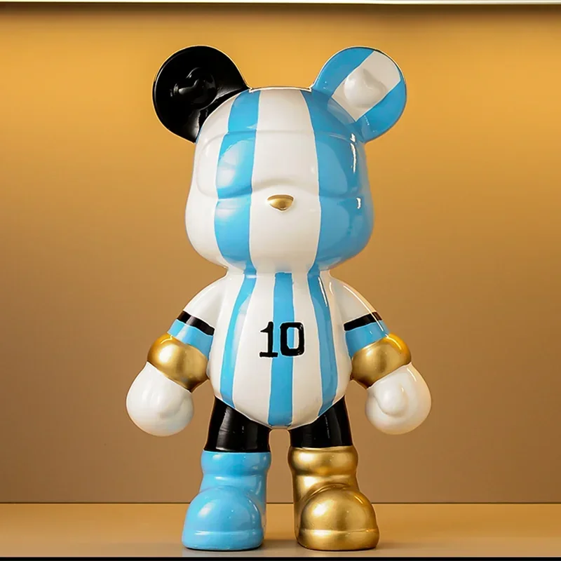 Perfecsy bear ceramic money bank with blue-white stripes, coin slot, gold accents on Tampa Home & Garden Store
