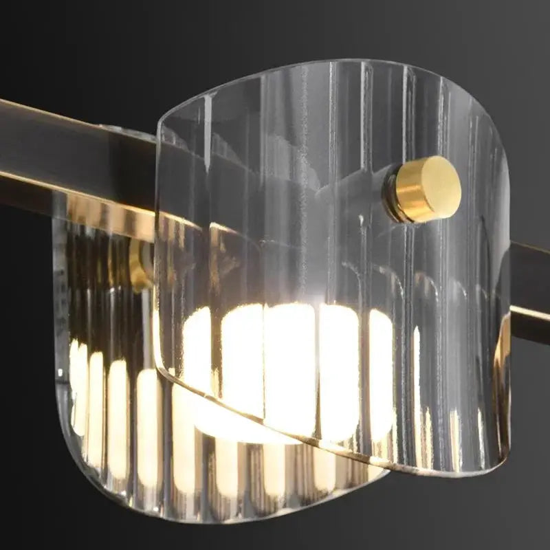 DecorBites LED pendant chandelier with curved clear glass shade and brass accents on Tampa Home & Garden Store