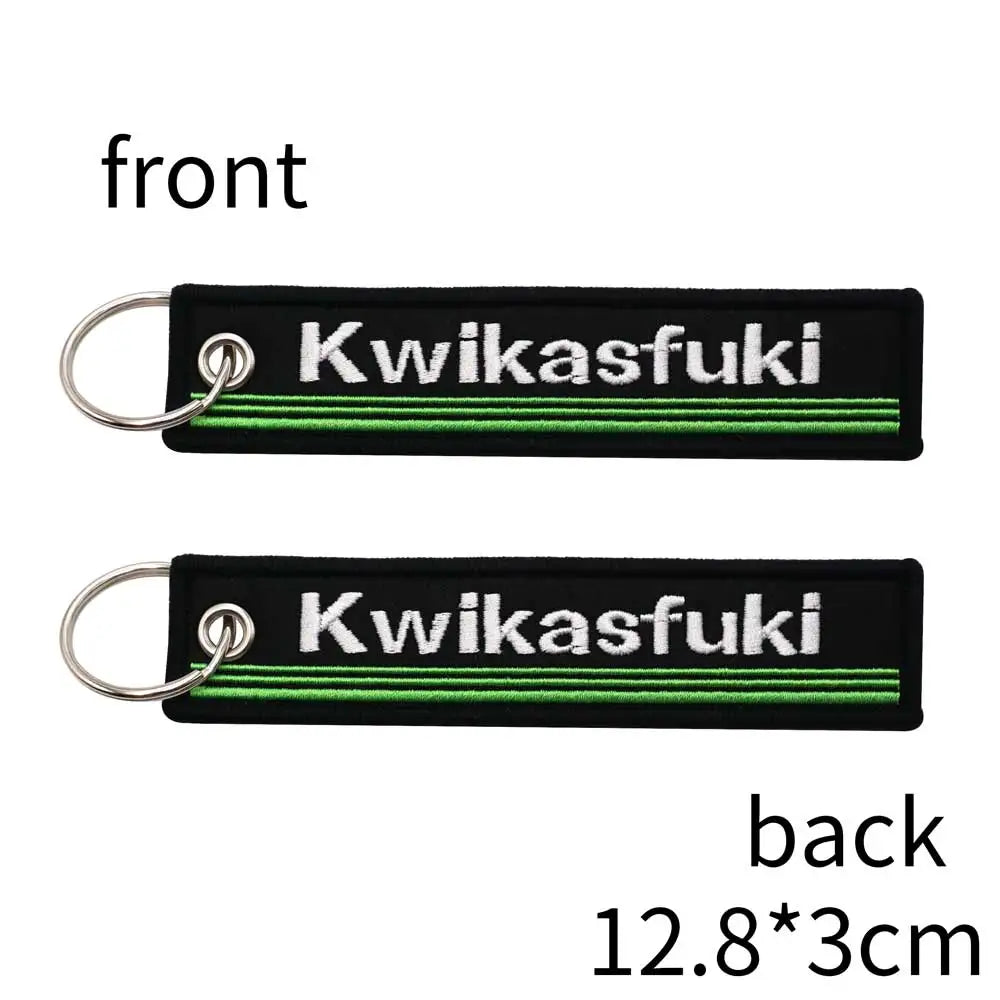 Kwikasfuki motorcycle keychain 2-pack, black fabric with white lettering and green stripe on Tampa Home & Garden Store