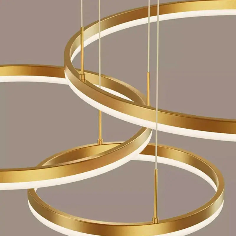 DecorBites LED pendant chandelier with gold rings and white LED glow, stair lighting on Tampa Home & Garden Store
