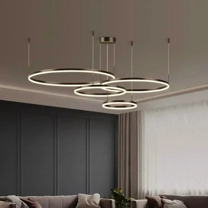 DecorBites LED pendant chandeliers, four circular rings in warm white light on Tampa Home & Garden Store