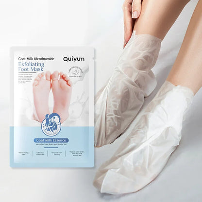 Exfoliating Foot Mask with goat milk essence and Quiyum logo feet in clear spa booties beside it on Tampa Home & Garden Store