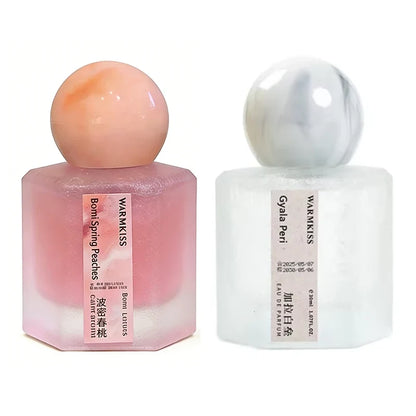 Silcy Skin rose perfume duo: pink bottle with peach cap and white bottle with marbled cap on Tampa Home & Garden Store