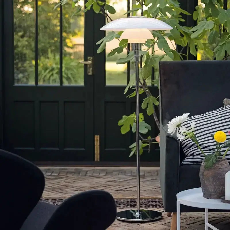 DecorBites LED floor lamp with white mushroom shade and chrome stem in a modern living room on Tampa Home & Garden Store