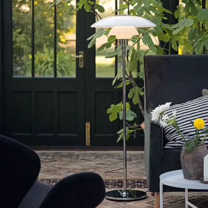 DecorBites LED floor lamp with white mushroom shade and chrome stem in a modern living room on Tampa Home & Garden Store