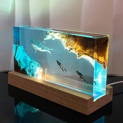 Seabed Exploration resin table light with 2 divers in blue underwater scene, block on wood base on Tampa Home & Garden Store