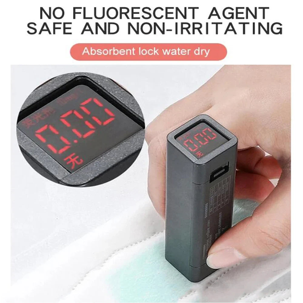 Anion sanitary pad test device with red LED 00.00 beside a pad on white background on Tampa Home & Garden Store