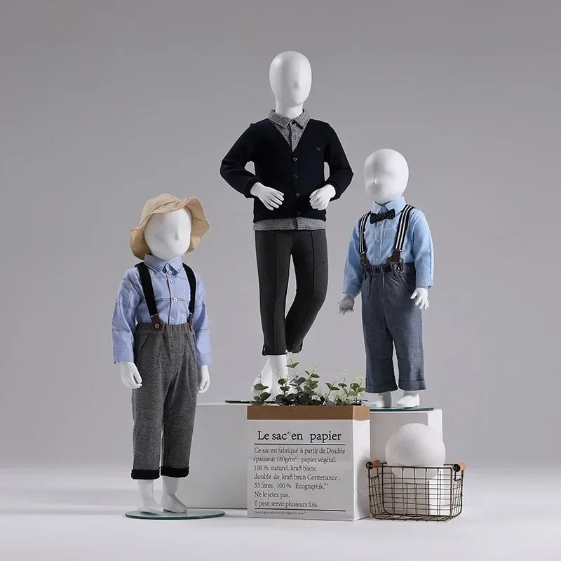Decorbites kids full-body mannequins trio in blue shirts with suspenders and bow ties on Tampa Home & Garden Store