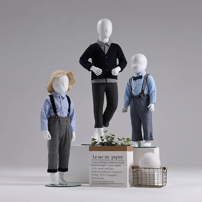 Decorbites kids full-body mannequins trio in blue shirts with suspenders and bow ties on Tampa Home & Garden Store
