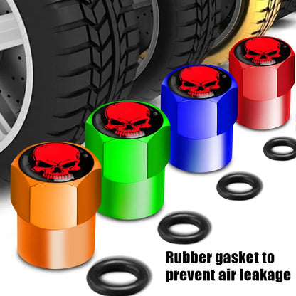 Set of 4 anodized valve stem caps in orange, green, blue, red with skull emblem and gaskets on Tampa Home & Garden Store