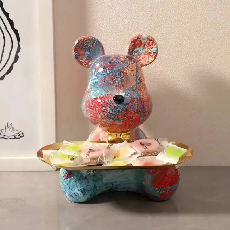 Graffiti bear figurine decor by Perfecsy with gold candy tray and multicolor paint and keys shelf on Tampa Home & Garden Store