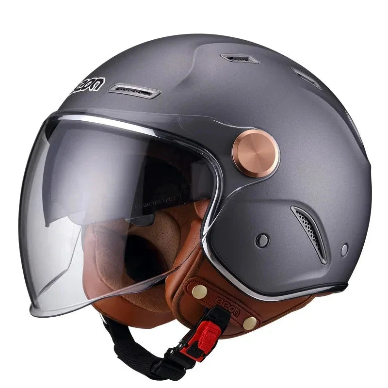 Retro open-face motorcycle helmet by BikerZoneZ, matte gray shell, brown leather lining, clear visor on Tampa Home & Garden Store