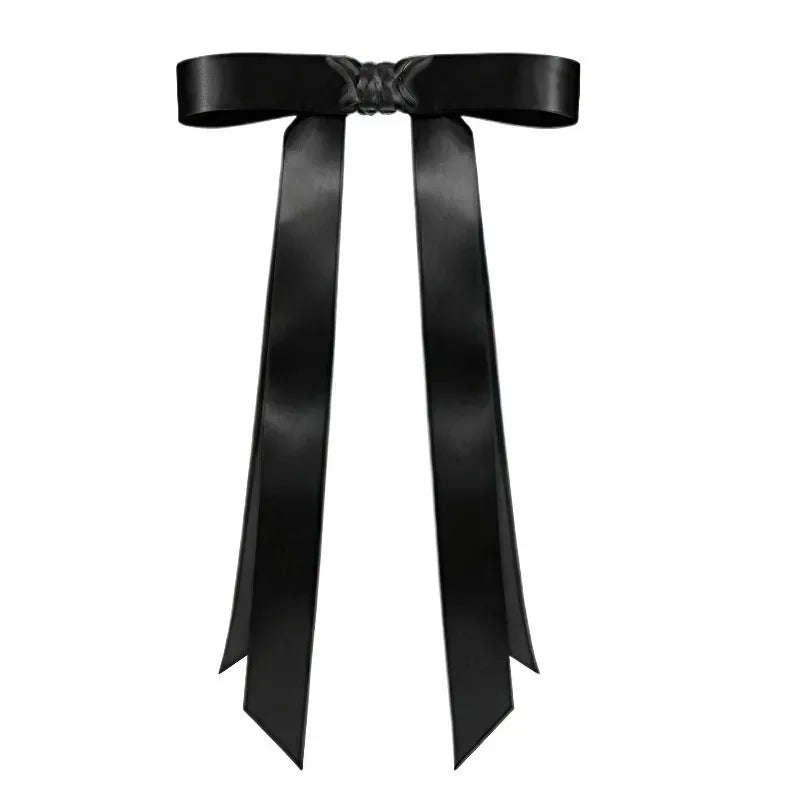 Black satin butterfly magnetic hair clip by Silcy Skin with long tails on Tampa Home & Garden Store