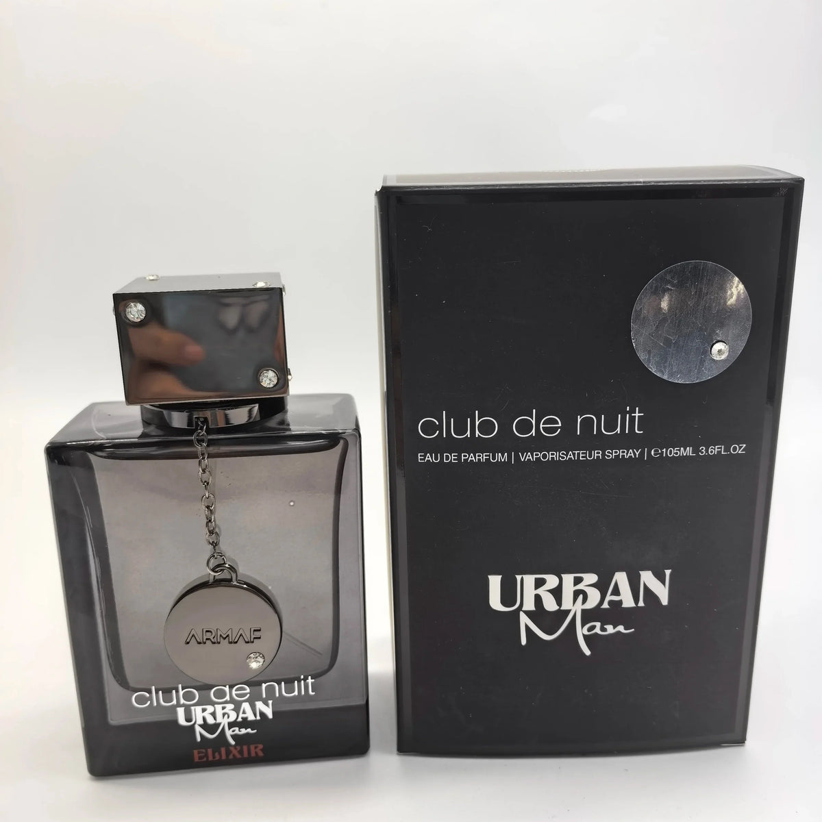 Armaf Club de Nuit Urban Man Elixir perfume bottle and black box with ARMAF logo on Tampa Home & Garden Store